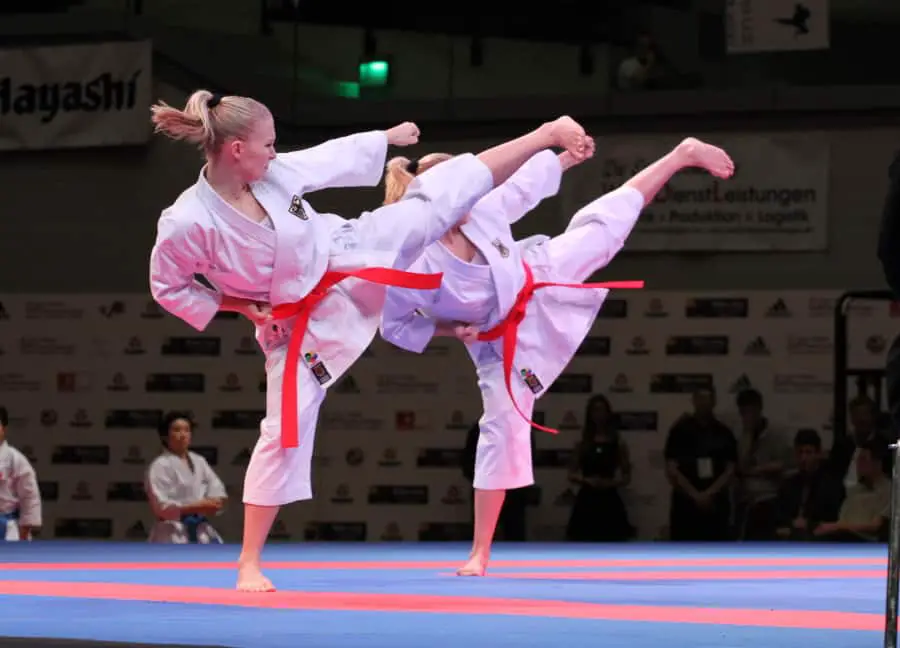 Image of a karate side kick by a woman