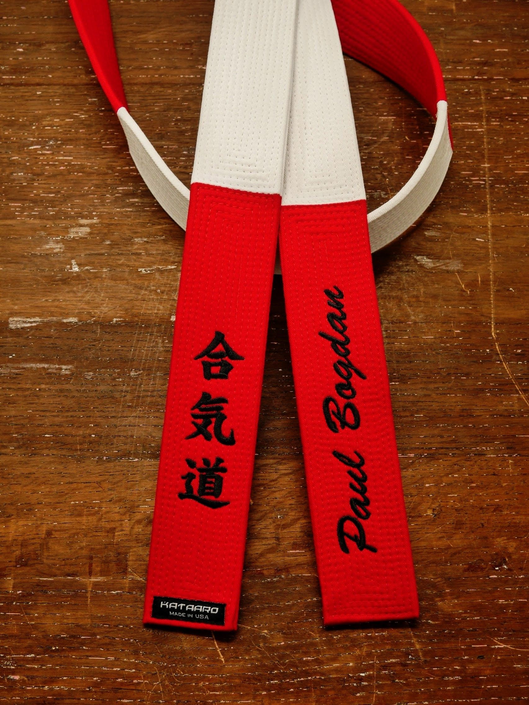 Red and White Panel Master Belt, featuring Black Script and Japanese